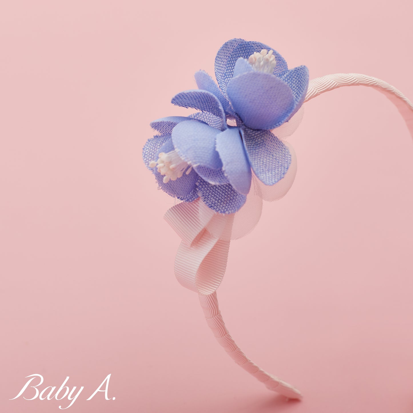 Serre tête fleur bleue