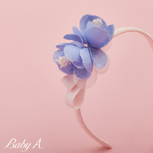 Serre tête fleur bleue