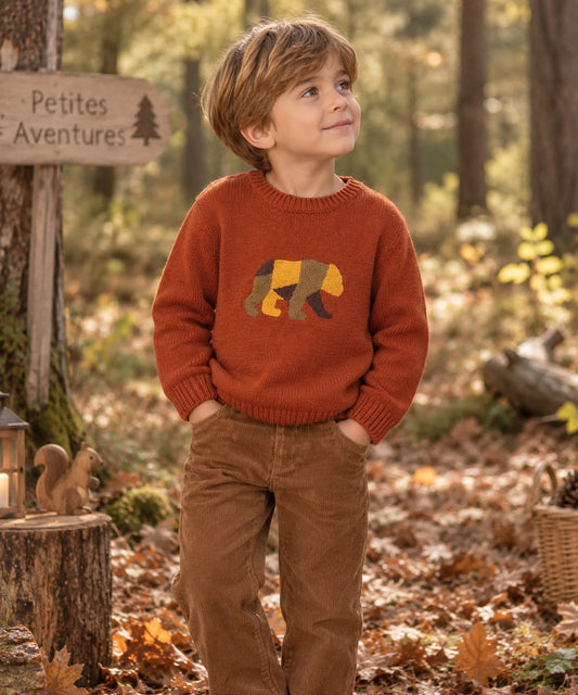 Pull orange avec un ours
