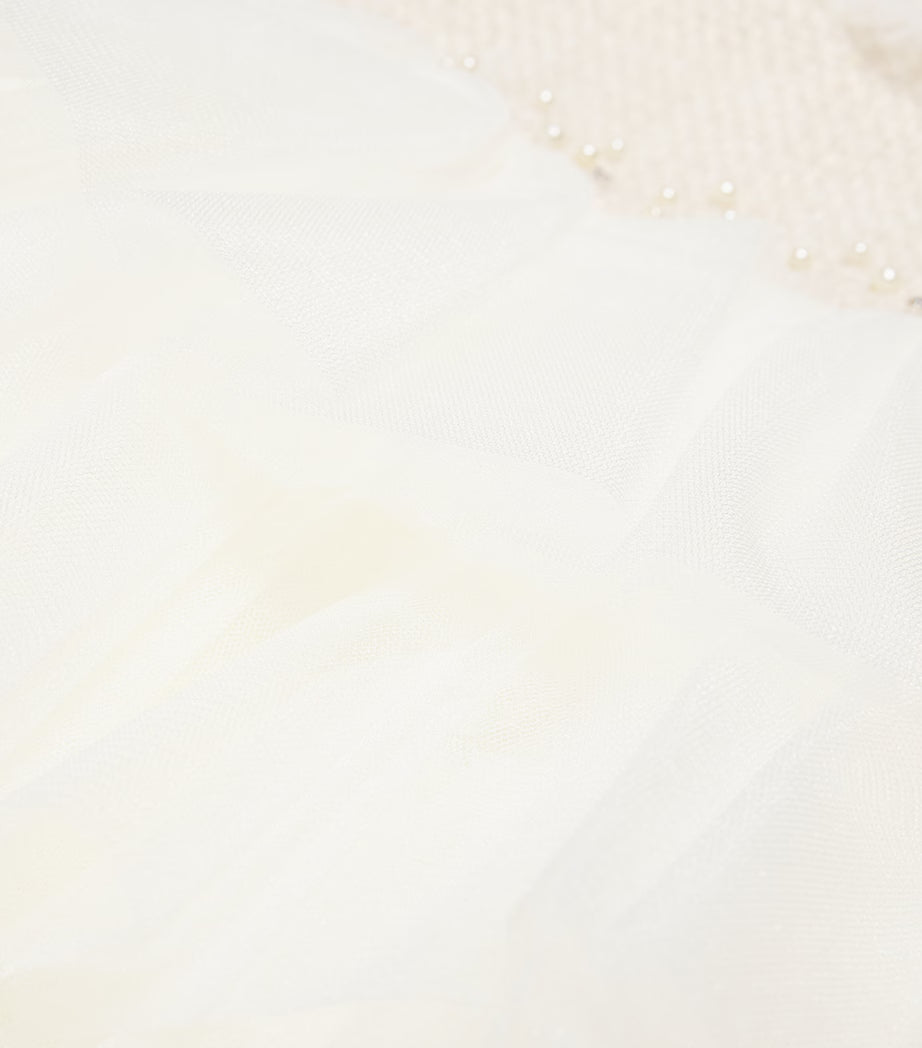 Robe ivoire avec des perles
